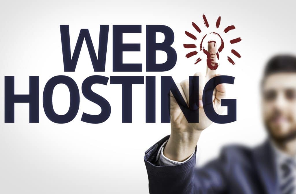 Business,Man,Pointing,To,Transparent,Board,With,Text:,Web,Hosting